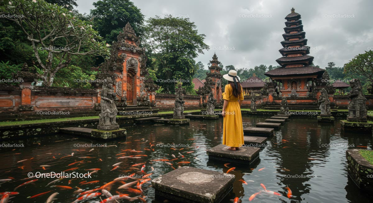Woman in Yellow Dress at Asian Temple with Koi Pond