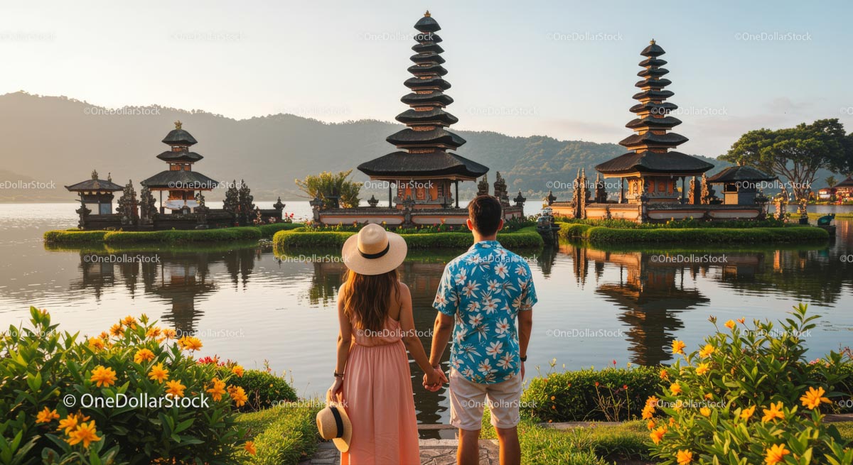 Couple Admiring Balinese Temple at Sunset