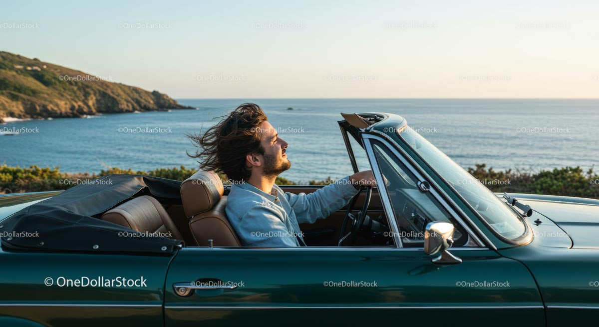 Man Driving Convertible Car Along Scenic Coastline