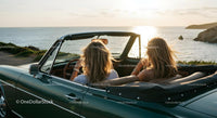 Friends on a Coastal Road Trip in Convertible Car