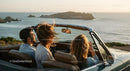 Friends on a Coastal Road Trip in Convertible Car