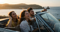Friends on a Coastal Road Trip in Convertible Car