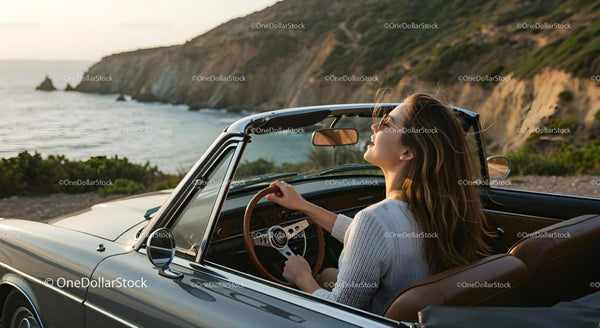 Woman Enjoying Scenic Coastal Drive in Convertible