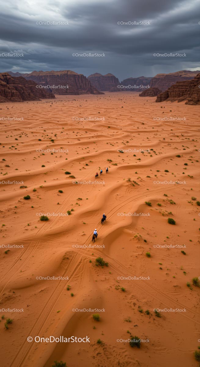 Riders Navigate Sand Dunes in Desert Landscape