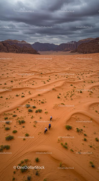 Horseback Riders Traversing Majestic Desert Dunes