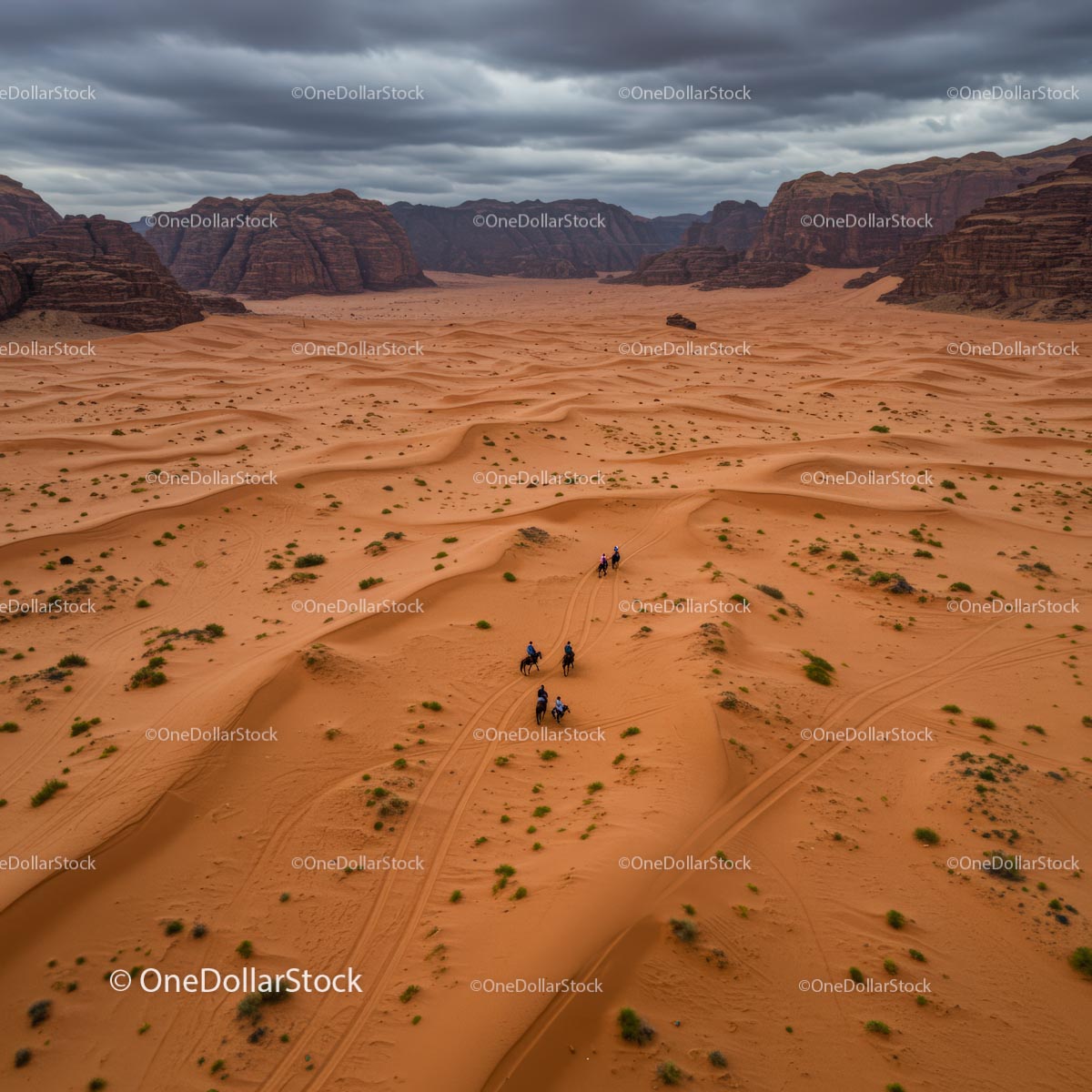 Horseback Adventurers Traversing Vast Desert Dunes