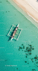 Aerial View of Traditional Boat on Turquoise Waters