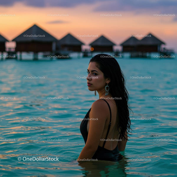 Woman Enjoying a Sunset Swim in Tropical Waters