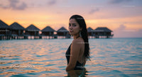 Woman Enjoying Sunset at Tropical Island Resort