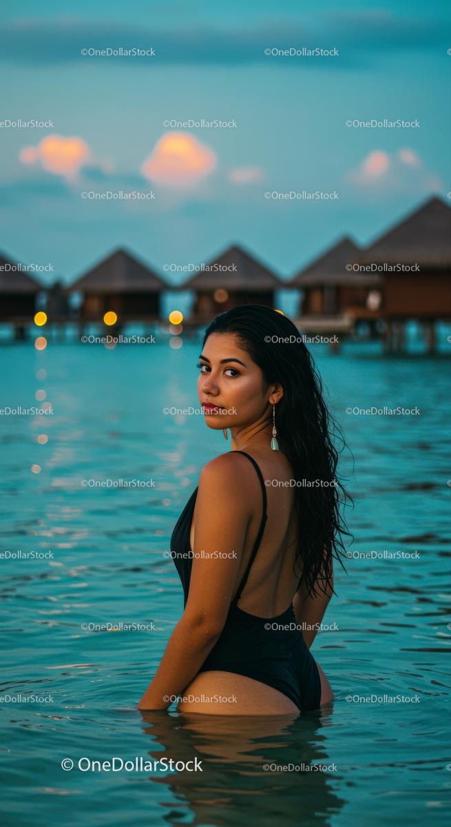 Woman Enjoying a Tropical Sunset in Scenic Lagoon