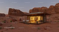 Modern Desert Cabin with Glass Facade at Sunset