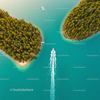 Motorboat Navigating Between Lush Green Islands