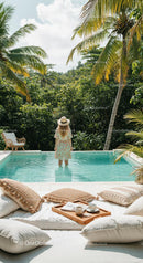 Woman Enjoying Tranquility by a Tropical Poolside
