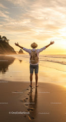 Person Embracing Sunset on Serene Beach