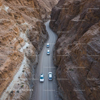 Winding Road Through Rugged Desert Canyon