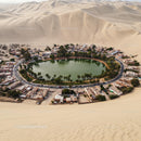 Serene Huacachina Oasis Amid Vast Desert Dunes