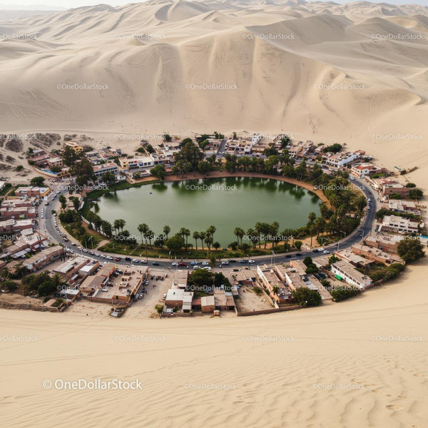 Serene Huacachina Oasis Amid Vast Desert Dunes