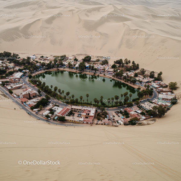 Aerial View of Huacachina Oasis in Desert Landscape