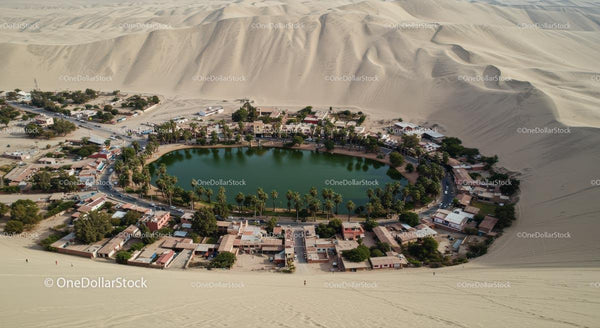 Aerial View of Oasis Village in Sand Dunes