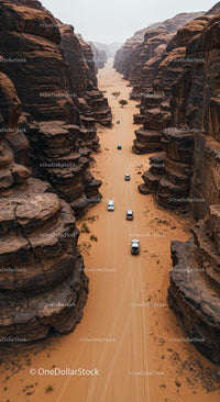 Off-Road Vehicles Driving Through Majestic Desert Canyon