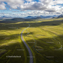Winding Road Through Verdant Countryside