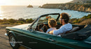 Father and Son Enjoying a Scenic Drive in Convertible
