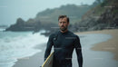 Surfer Walking on Rainy Beach with Wetsuit