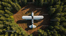 Abandoned Airplane in Forest Clearing from Above