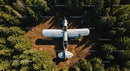 Abandoned Plane Amidst Dense Forest from Above