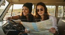 Two Friends on an Adventurous Road Trip with Map