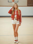 Young Woman in Red Jacket on Basketball Court