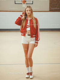 Young Woman in Red Jacket on Basketball Court