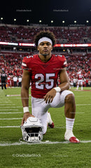 Focused Football Player on Game Day Field