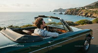 Two Women Driving Vintage Convertible by Ocean