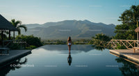 Woman Relaxing by Infinity Pool with Mountain View