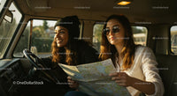 Two Friends Planning a Road Trip Adventure in a Car