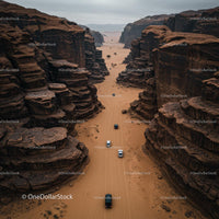 Aerial View of Cars Traversing Desert Canyon Road