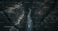 Cars Navigating Dramatic Canyon Road