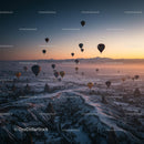 Hot Air Balloons Over Snowy Cappadocia at Sunrise