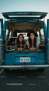 Two Friends Enjoying Road Trip in Vintage Blue Van