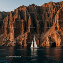 Sailing Boat by Dramatic Rocky Cliffs at Sunset