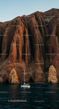 Sailing Adventures by Majestic Rugged Cliffs