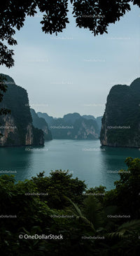 Majestic Cliffs and Tranquil Waters Surrounded by Lush Foliage