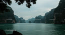 Misty Limestone Cliffs and Tranquil Waters