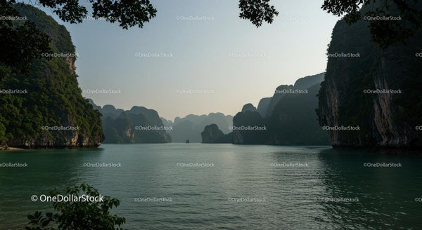 Tranquil Bay with Limestone Cliffs and Serene Waters