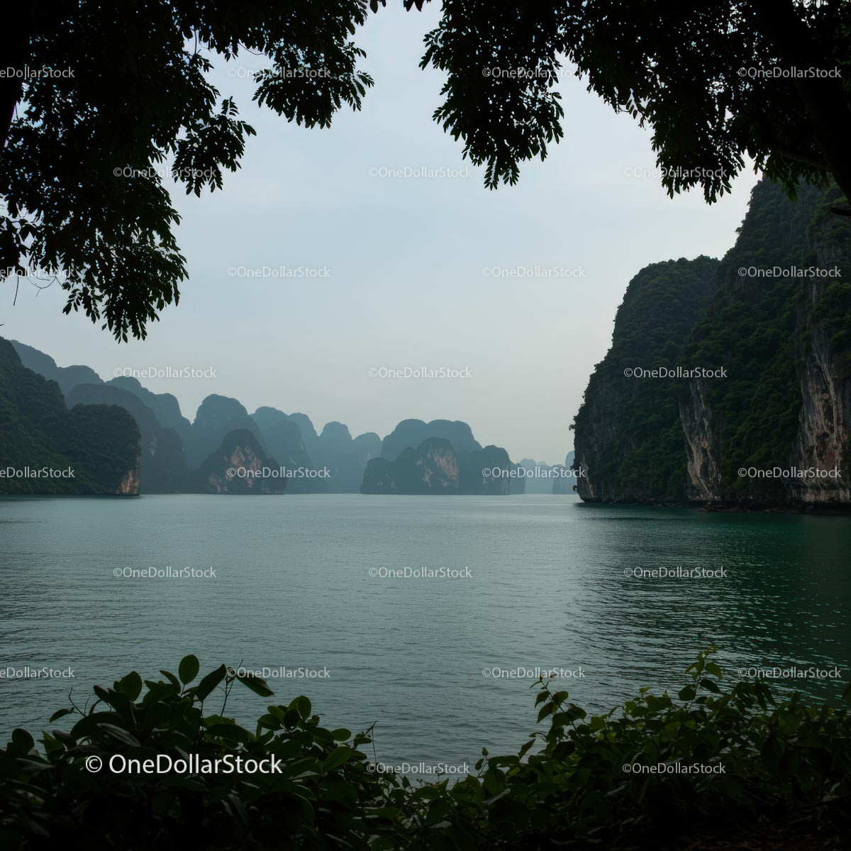Tranquil Bay Surrounded by Rocky Islands and Lush Greenery