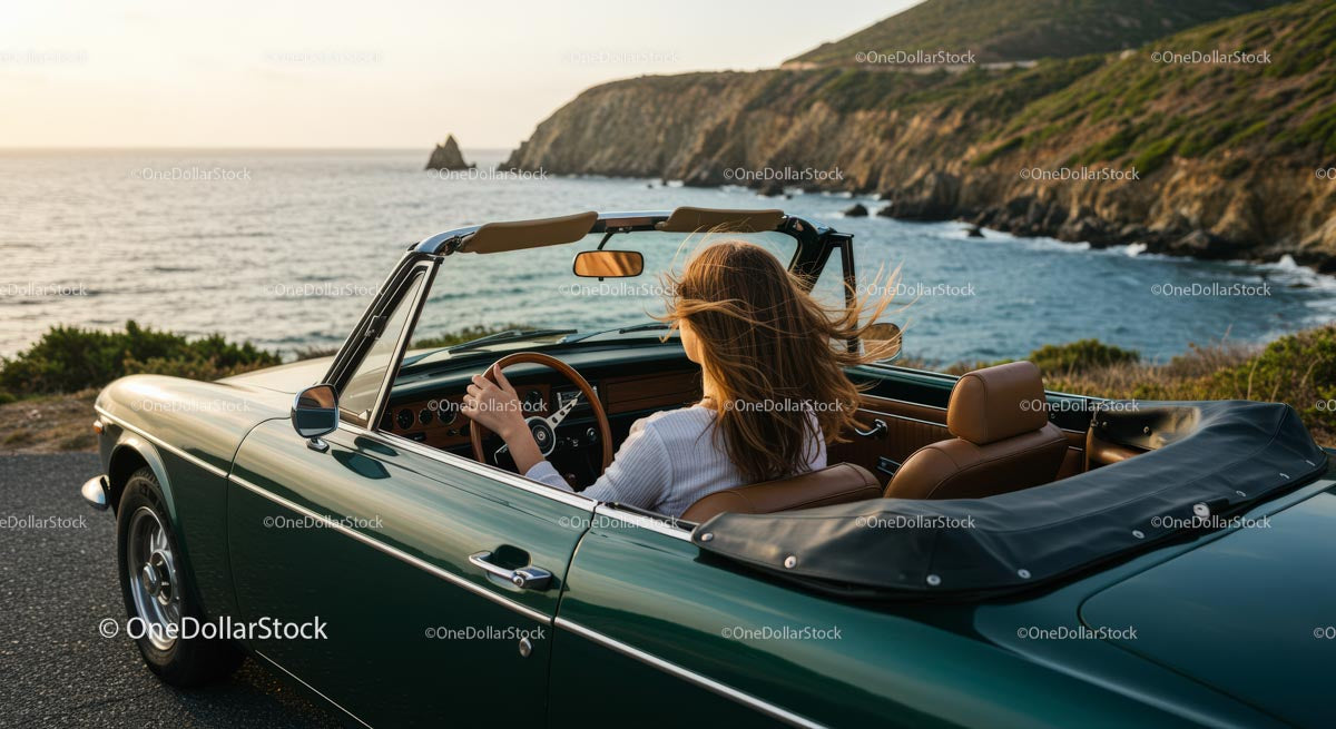 Two Women Driving Vintage Convertible by Ocean