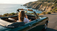 Woman Enjoying Convertible Drive Along Scenic Coastal Route