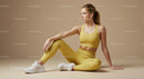 Woman Meditating in Brown Outfit on Yoga Mat