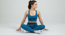 Woman in Yoga Pose Wearing Blue Sportswear